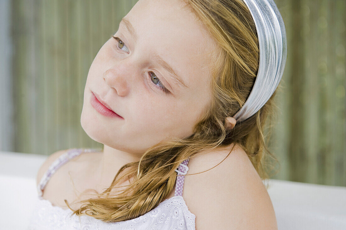 Close-up of a girl thinking