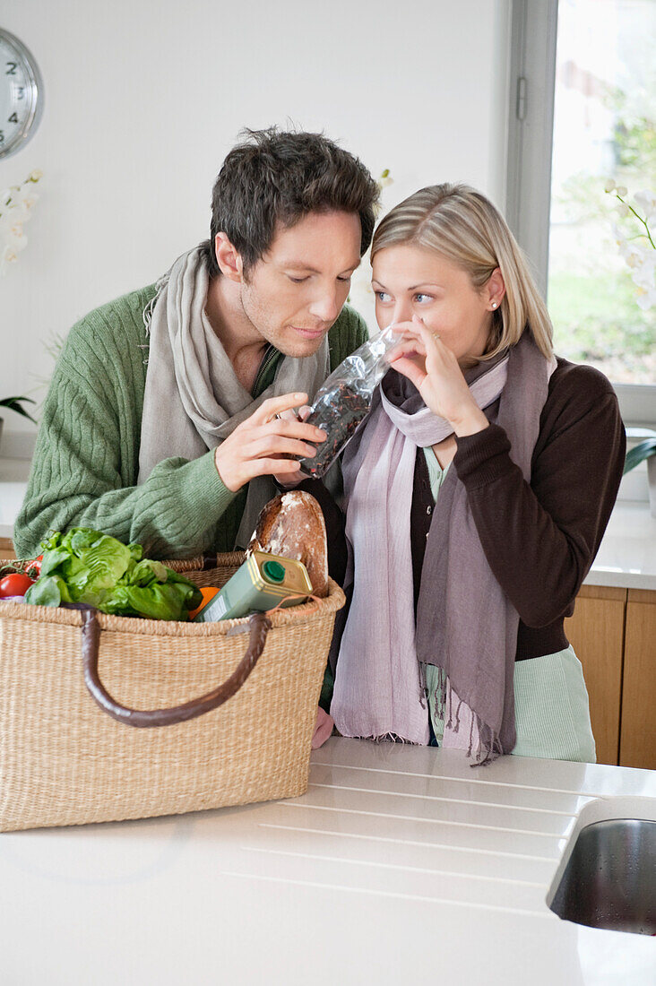 Couple smelling food