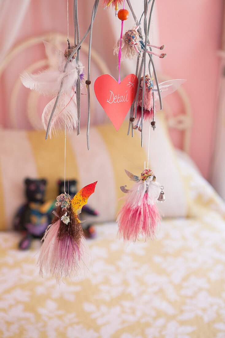 Close-up of wind chime decorated in a bedroom