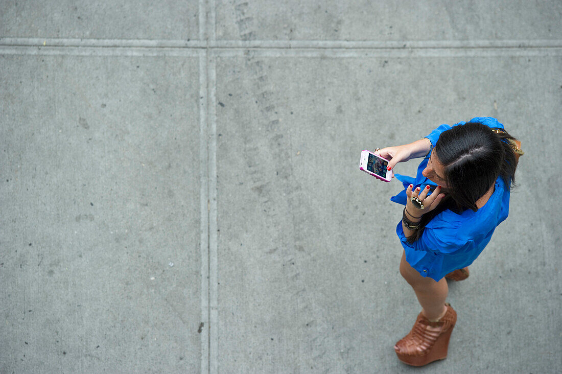 Woman with a mobile phone, Meatpacking District, Manhattan, New York City, New York, USA