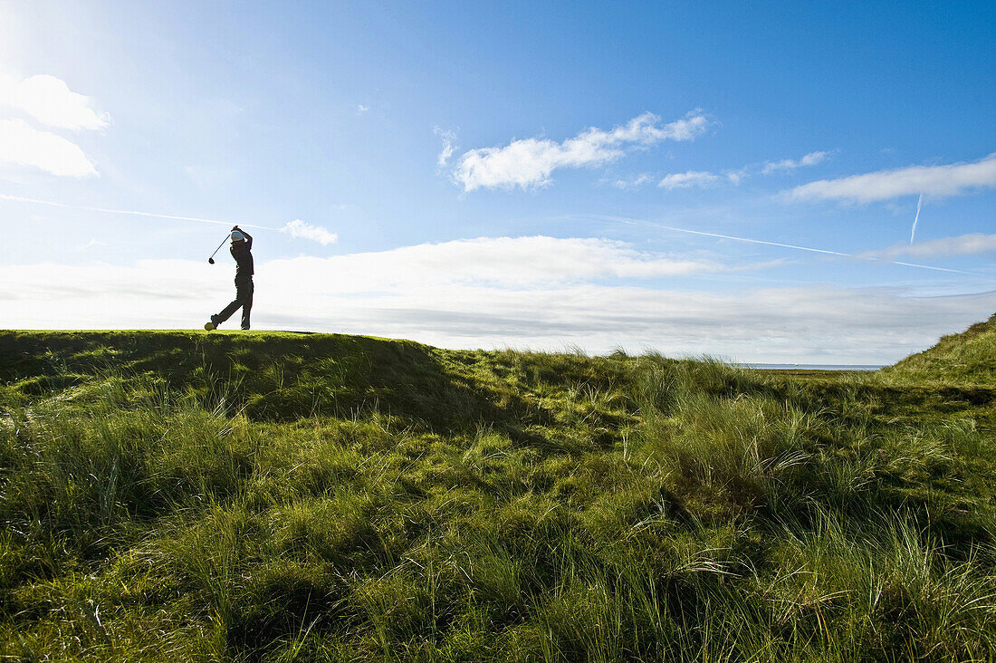 Person playing golf, Norderney, East Frisian Islands, Lower Saxony, Germany