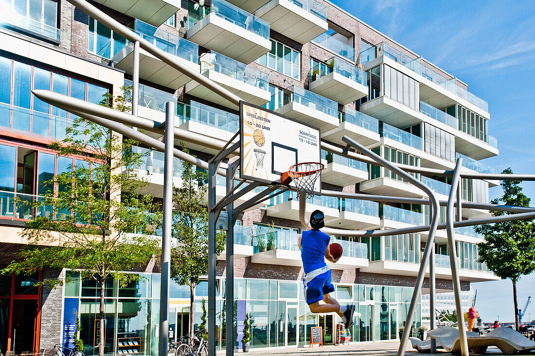 Children playing basketball, HafenCity, Hamburg, Germany