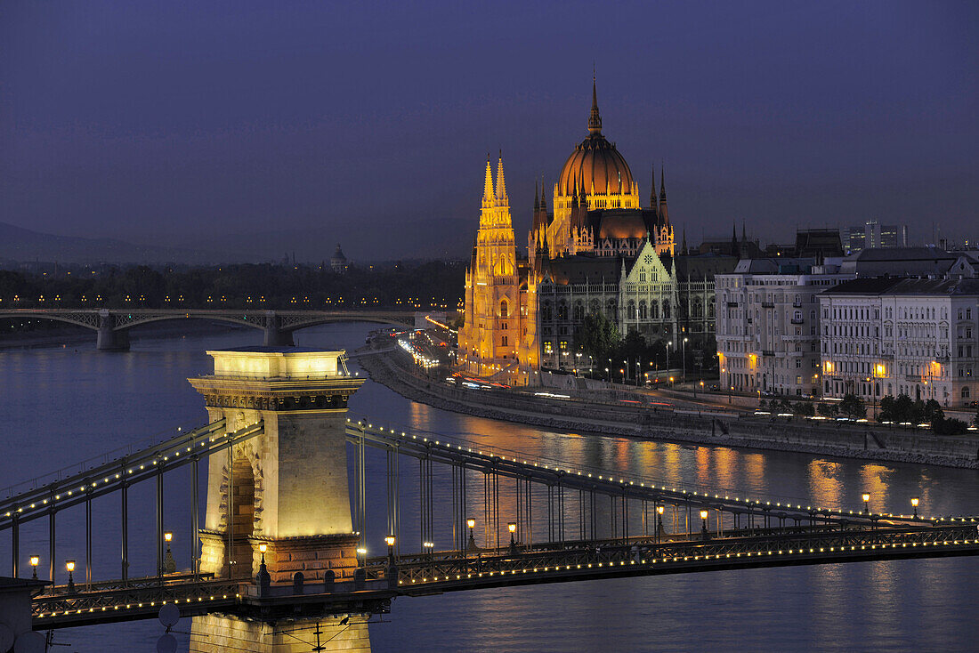 View of Danube river, Chain Bridge and House of Parliament at night, Budapest, Hungary, Europe