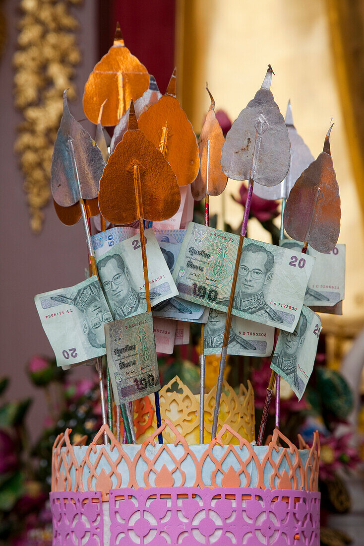 Offerings at Phra Pathom Chedi, world's tallest Buddhist monument, Nakhon Pathom, Thailand