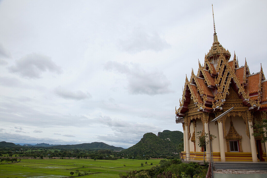 Overhead of rice and agricultural fields seen from Wat Tham Khao Noi, Khao Noi Cave Temple, near Kanchanaburi, Thailand