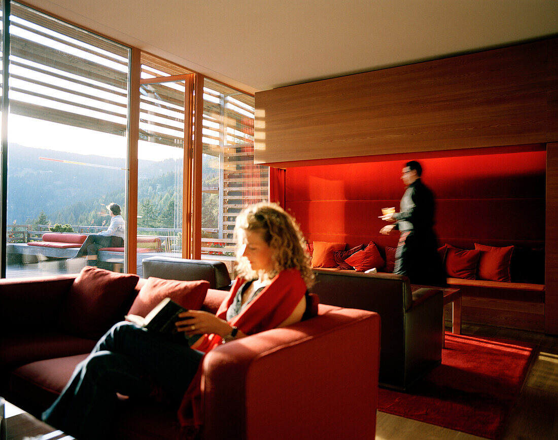 Hotel guestes in piazza lounge, Vigilius Mountain Resort, Vigiljoch, Lana, Trentino-Alto Adige/Suedtirol, Italy