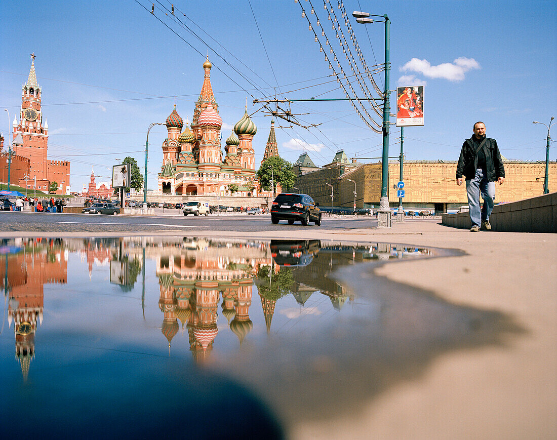 Street and puddle in front of the St. Basil's Cathedral and Red Square, Moscow, Russia, Europe