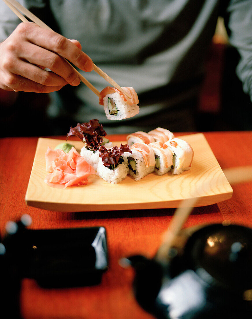 Ukrainian Sushi Roll coated in bacon, restaurant near  metro station Novoslobotskaya, Moscow, Russia, Europe