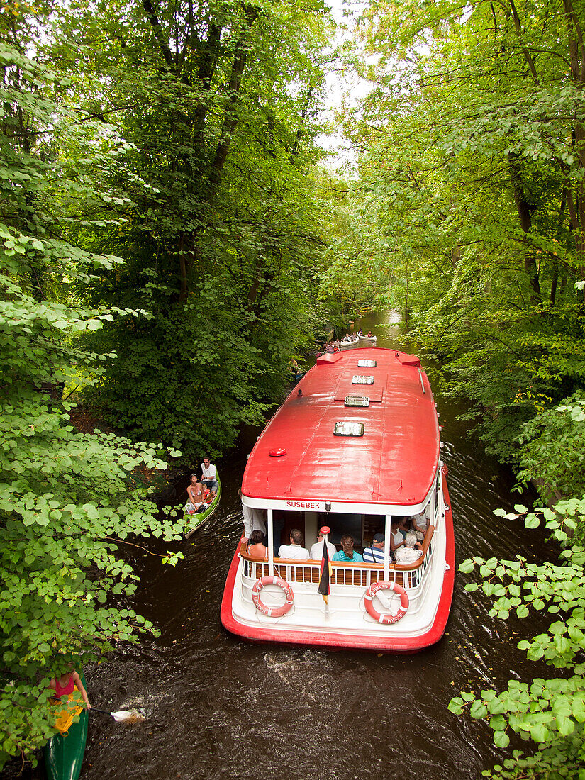 Alster steamer on a narrow canal, Hanseatic City of Hamburg, Germany