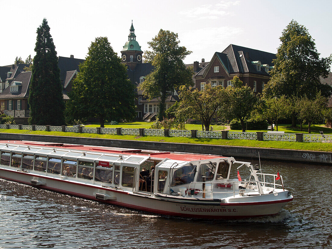 Alster steamer on the Alster river in front of Saint Johannis Abbey, Hanseatic City of Hamburg, Germany