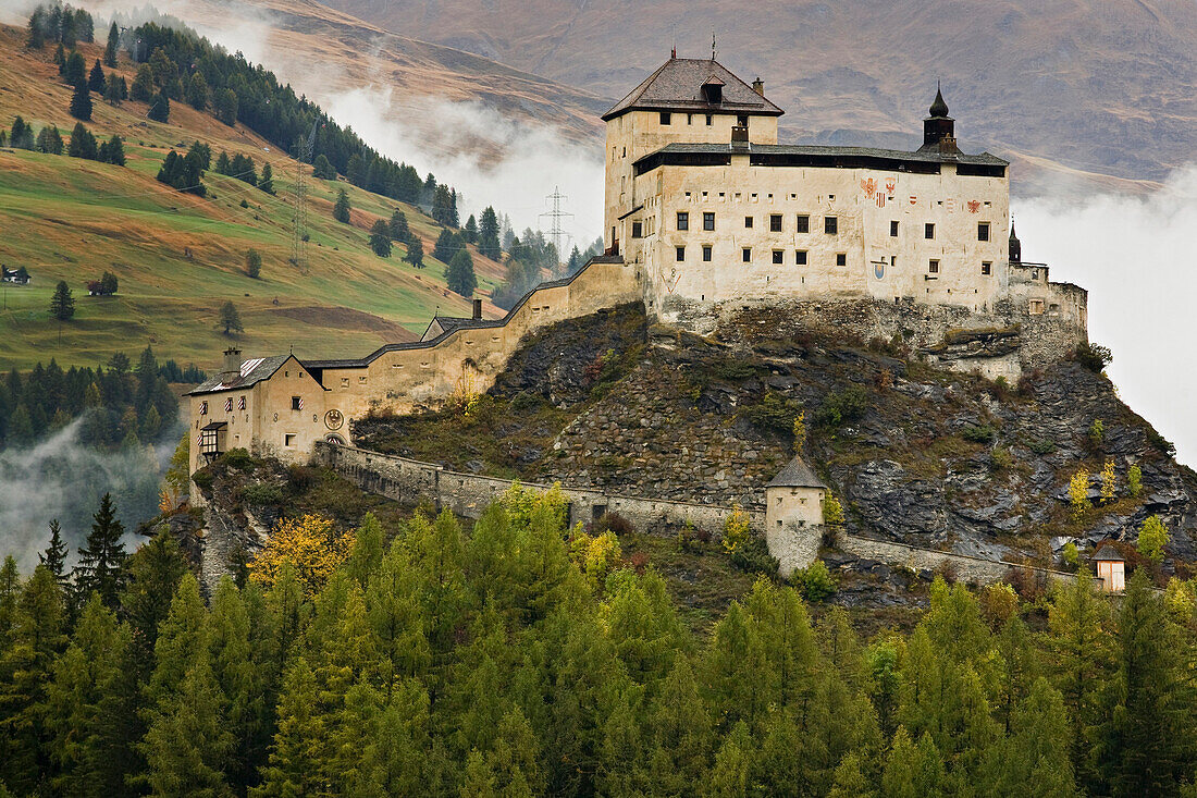 View of Tarasp castle in autumn, Engadin, Grisons, Switzerland, Europe