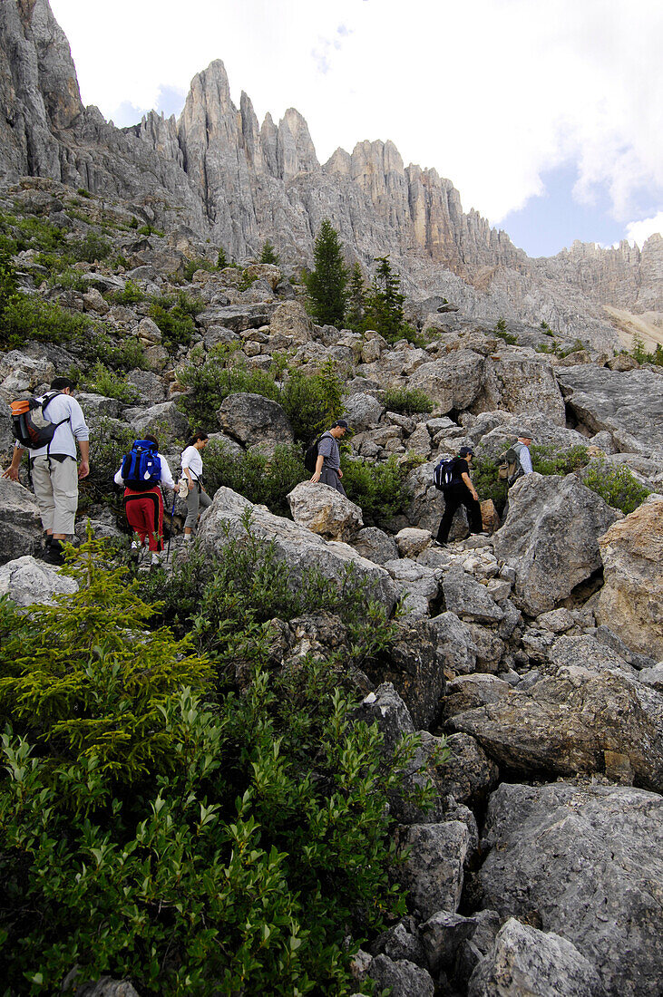 Hikers at the  Karer Pass, Nova Levante, Alto Adige, South Tyrol, Italy