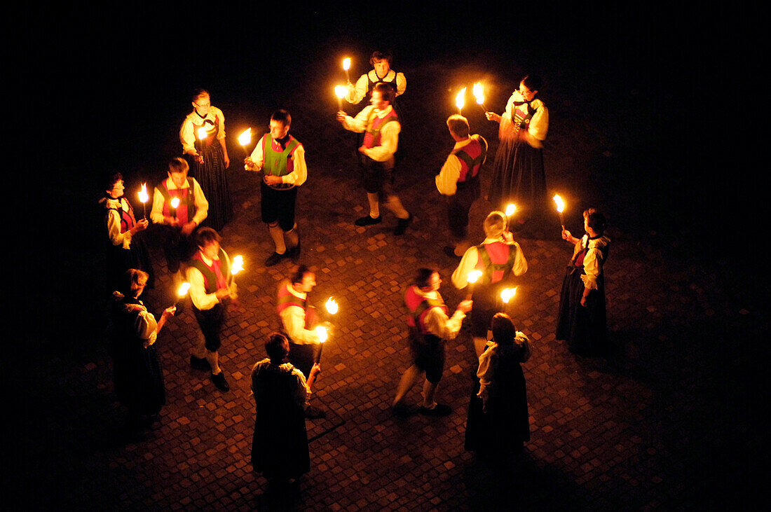South Tyrol traditional dancing with torches, Alto Adige, South Tyrol, Italy