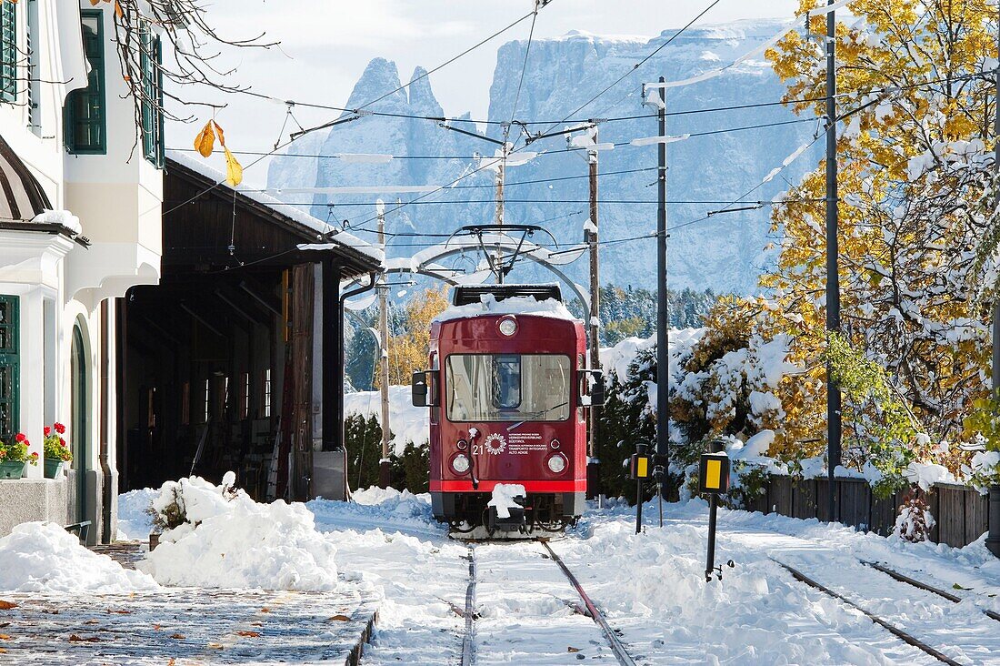The Ritten railway in the fresh snow, Soprabolzano, Schlern, South Tyrol, Alto Adige, Italy, Europe