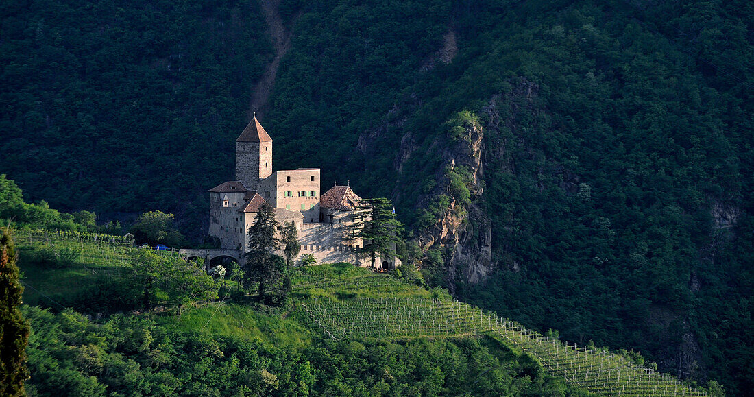 View of Karneid castle in front of a mountainside, Eggental valley, South Tyrol, Alto Adige, Italy, Europe