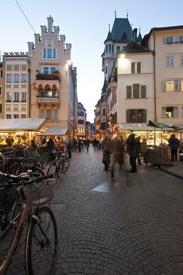 People on the street at the old town in the evening, Bolzano, South Tyrol, Alto Adige, Italy, Europe