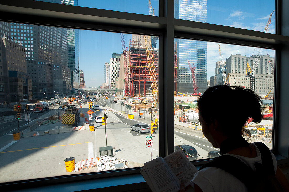Girl Checking A Map In Front Of The World Trade Center Building Site, Manhattan, New York, USA