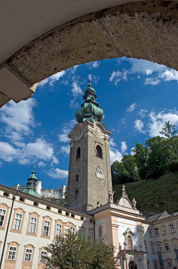 View of spire through arch in Salzburg, Salzburg, Austria