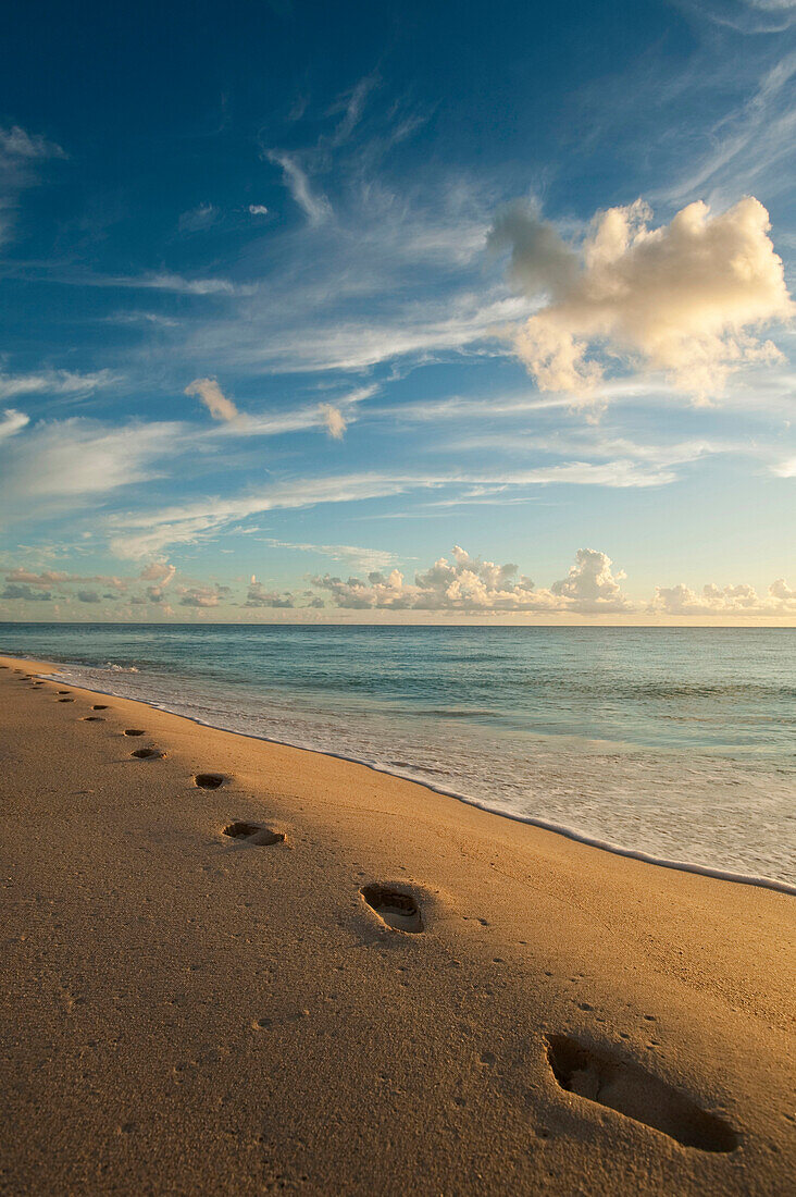 Footsteps on Brighton Beach at dusk, Barbados, Barbados