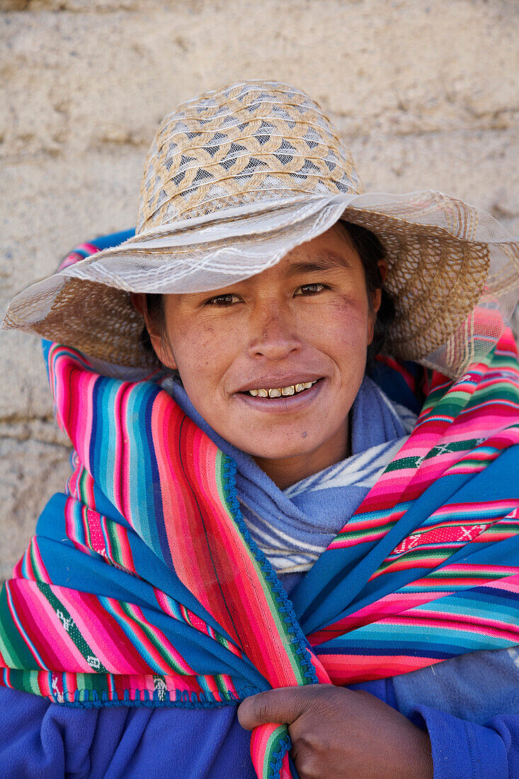 Woman wearing traditional blanket, Cordillera Real, Bolivia