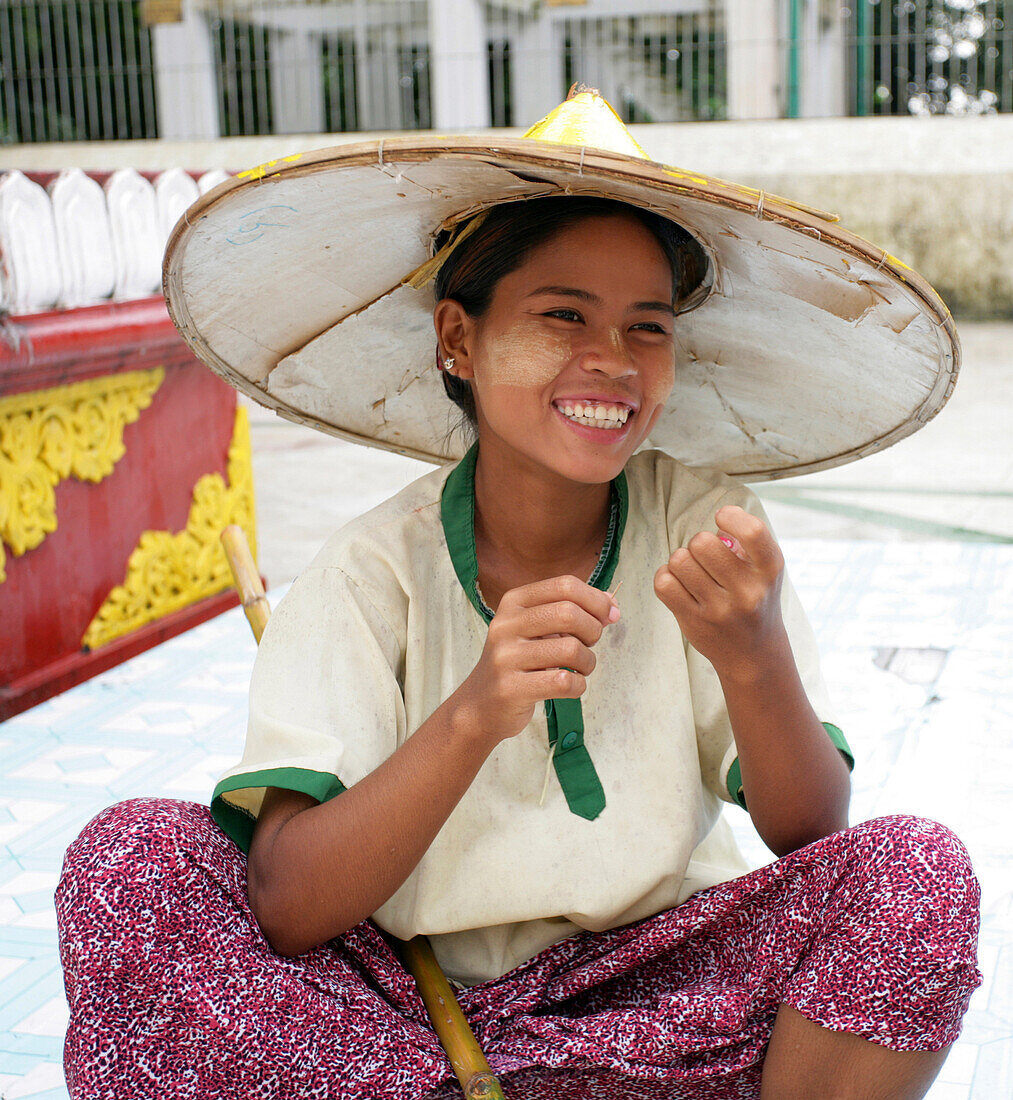 Woman in conical hat miling, Rangoon, Burma (Myanmar)