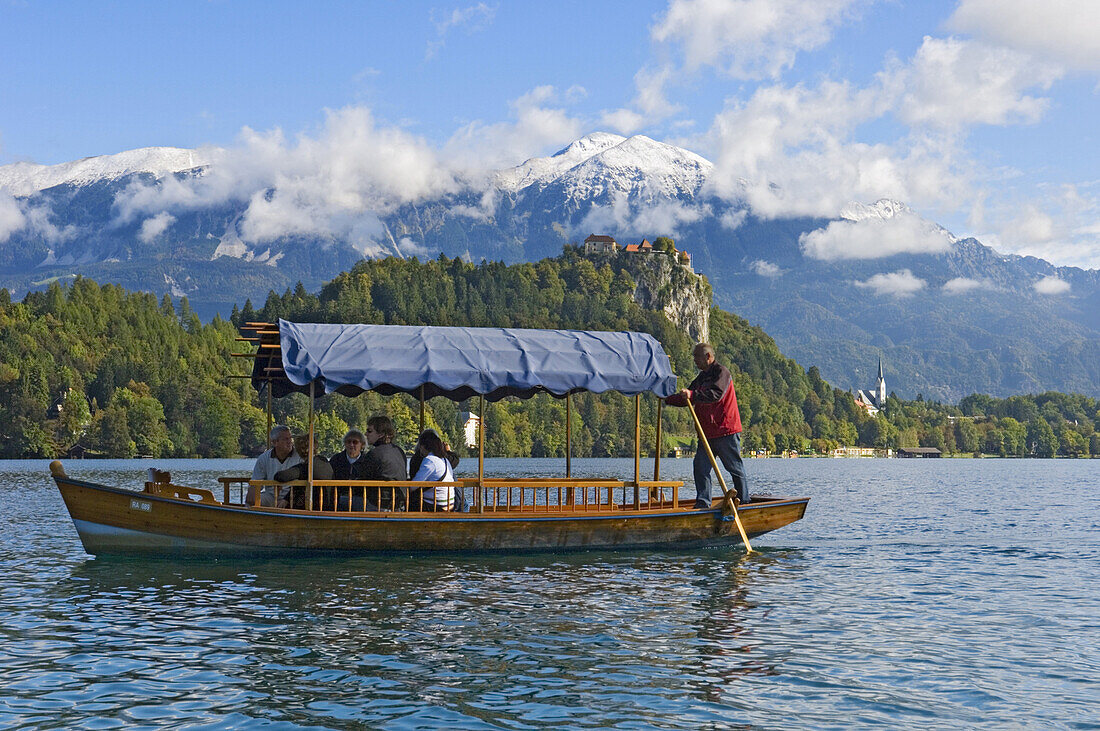 Tourists on Pletna boat, Lake Bled, Gorenjska Region, Slovenia