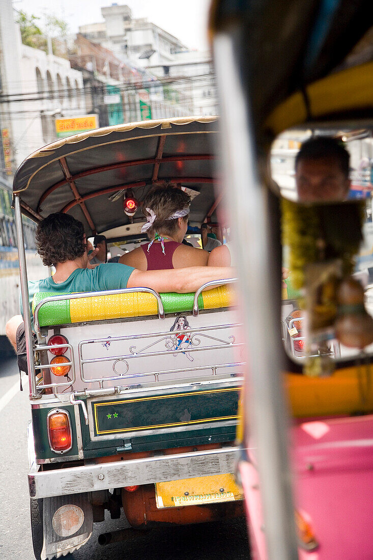 Tourists on tuk tuk in  Bangkok, Thailand