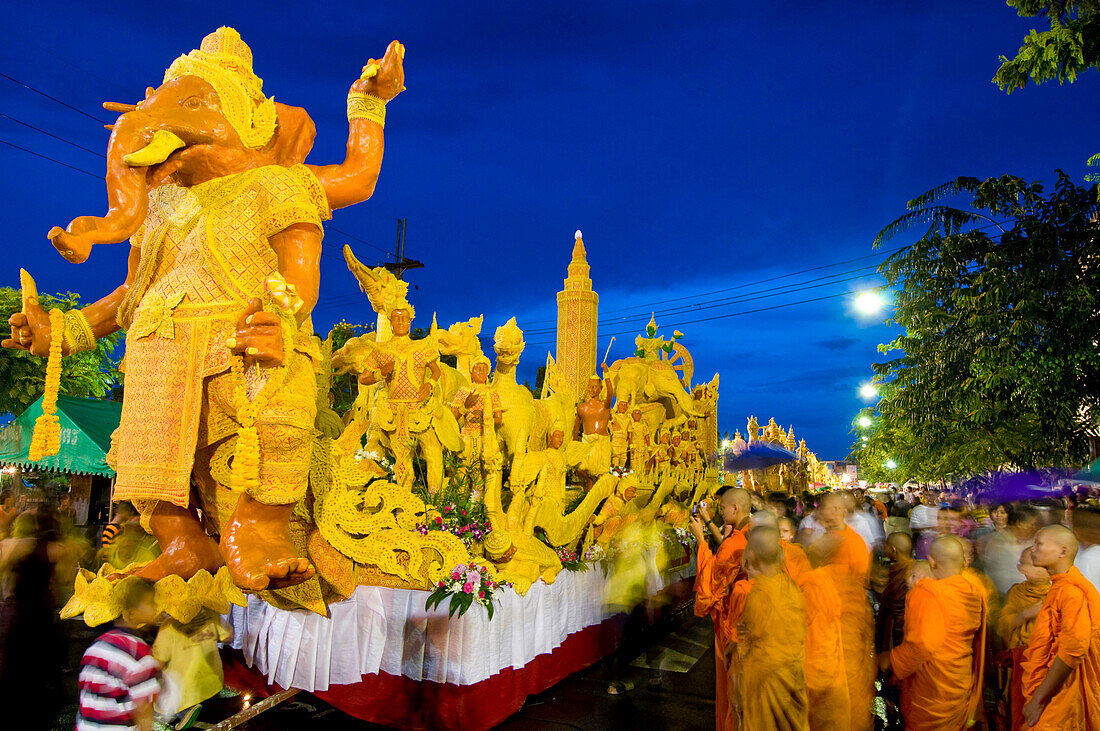 Procession of wax floats at stret feslival, Ubon Ratchathani, Thailand