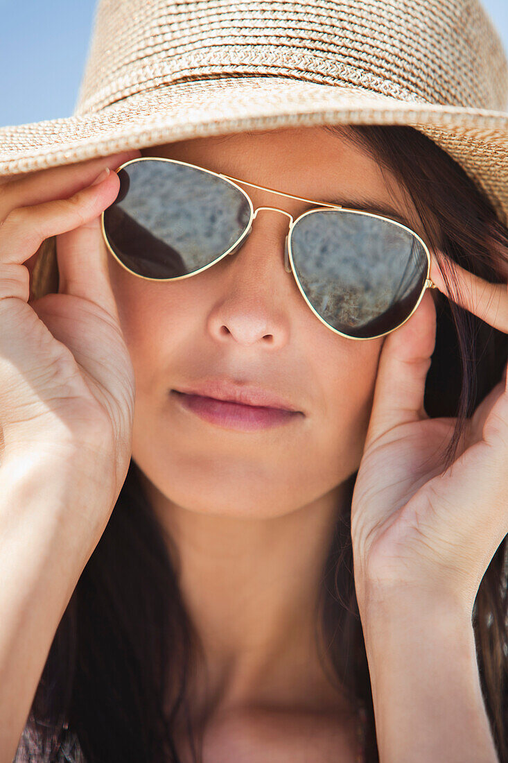 Close-up of a woman wearing sunglasses