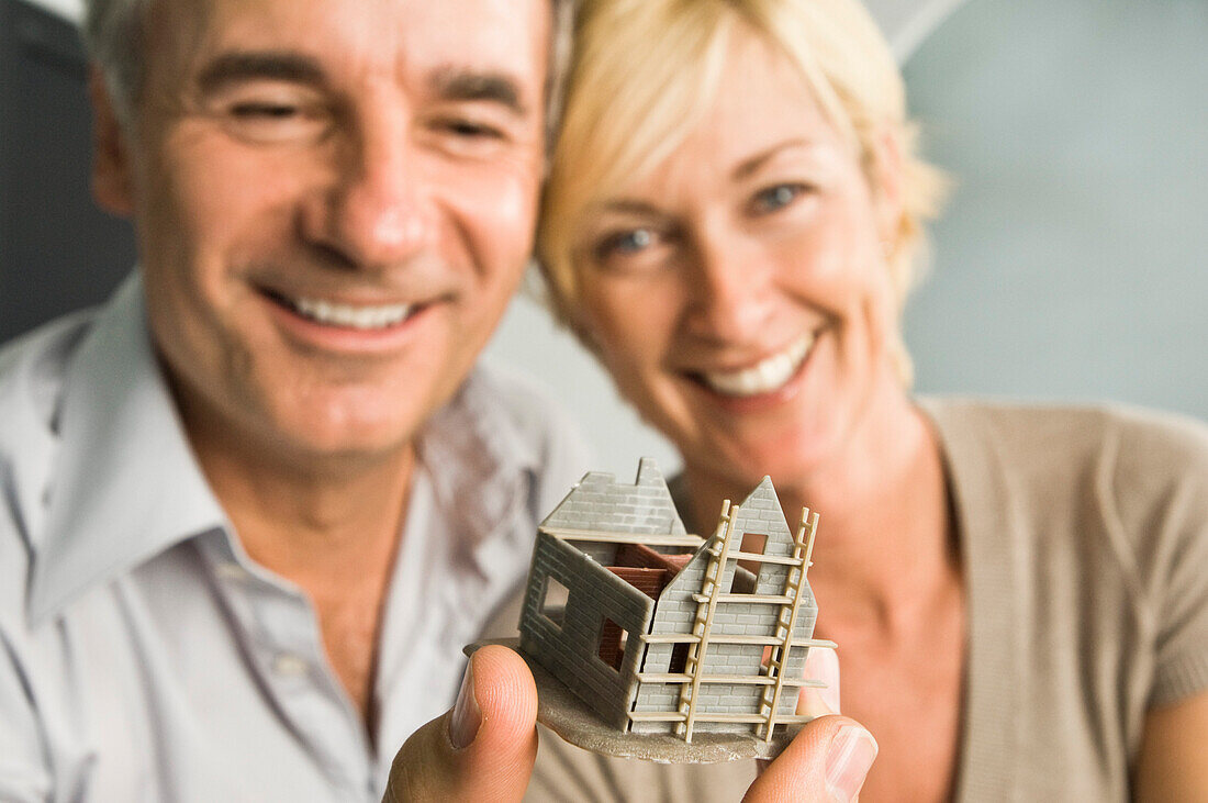 Couple looking at a model home