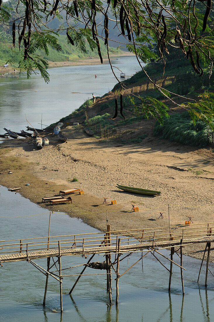 Bamboo bridge crossing Nam Khan river, tributary to Mekong river, Luang Prabang, Laos