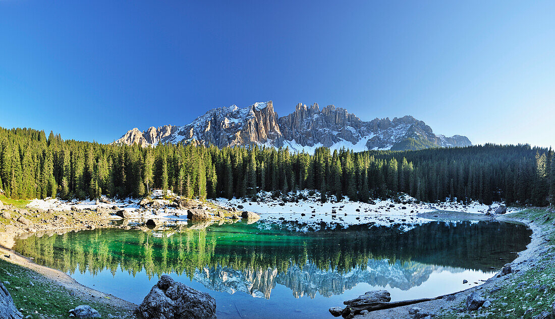 Panorama of lake Karersee with Latemar mountain range in the background, Dolomites, UNESCO World Heritage Site, South Tyrol, Italy