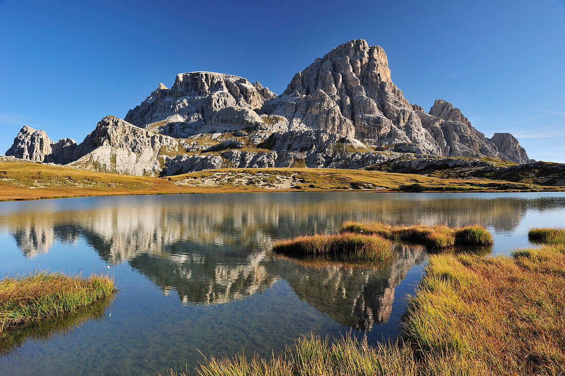 Lake Boedensee with Schusterplatte, Tre Cime di Lavaredo range, Dolomites, UNESCO World Heritage Site, South Tyrol, Italy