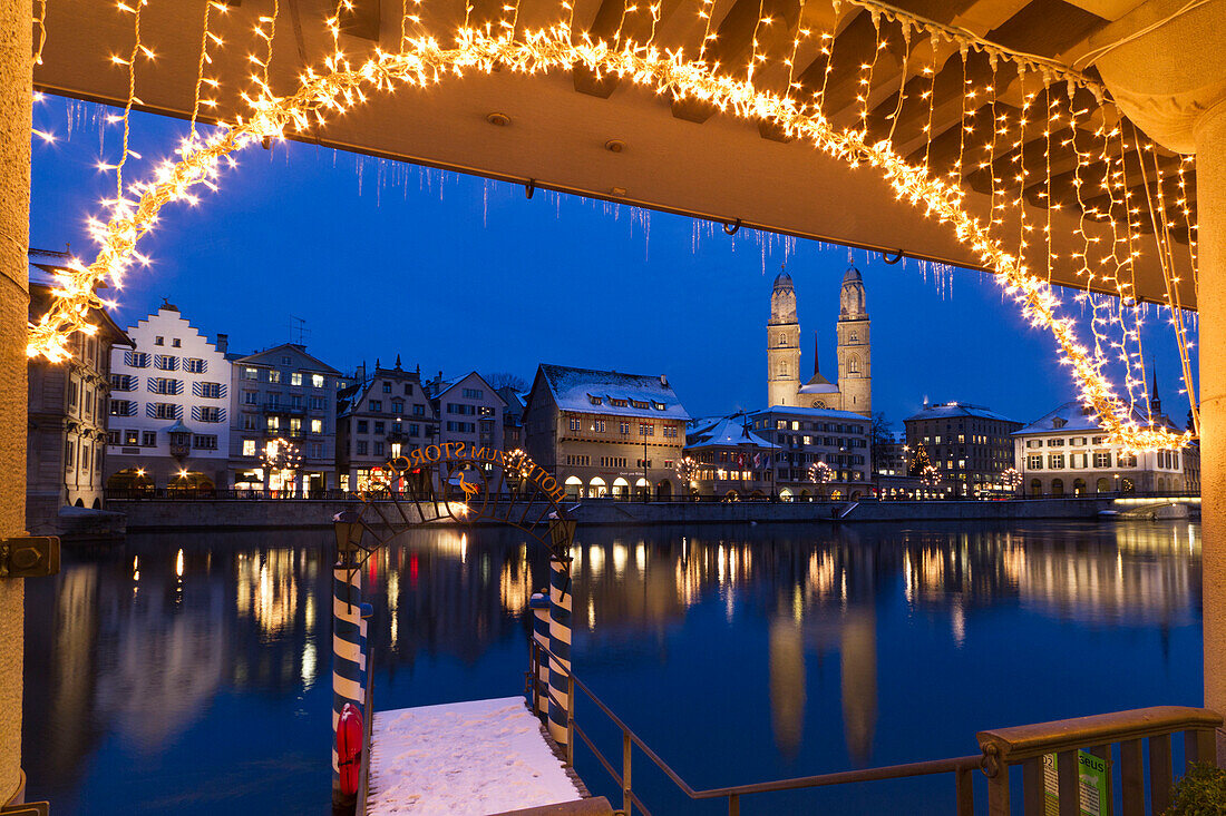 Pier at the Hotel Storchen, old town center, river Limmat at night, Limmatquai Grossmunster, Zurich, Switzerland