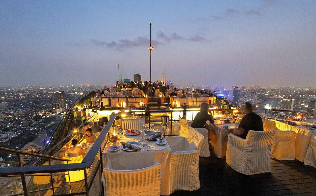 People at the roof terrace of Banyan Tree hotel in the evening, Vertigo Bar, Bangkok, Thailand, Asia