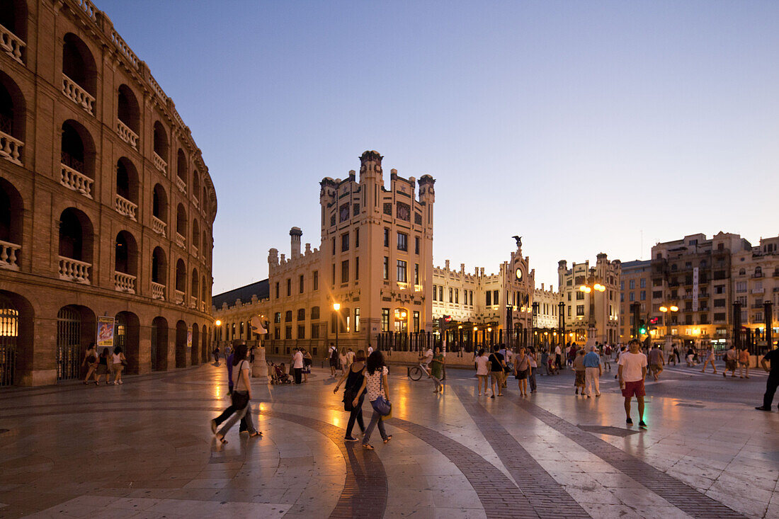 Plaza de Toros, people in front of bullfighting arena next to the railway station in the evening, Valencia, Spain, Europe