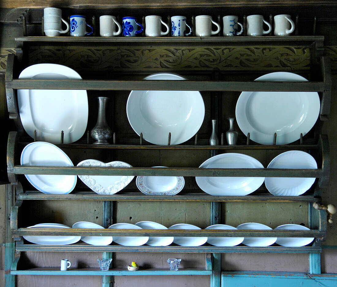 Ceramic dishes in a shelf, South Tyrol, Italy, Europe