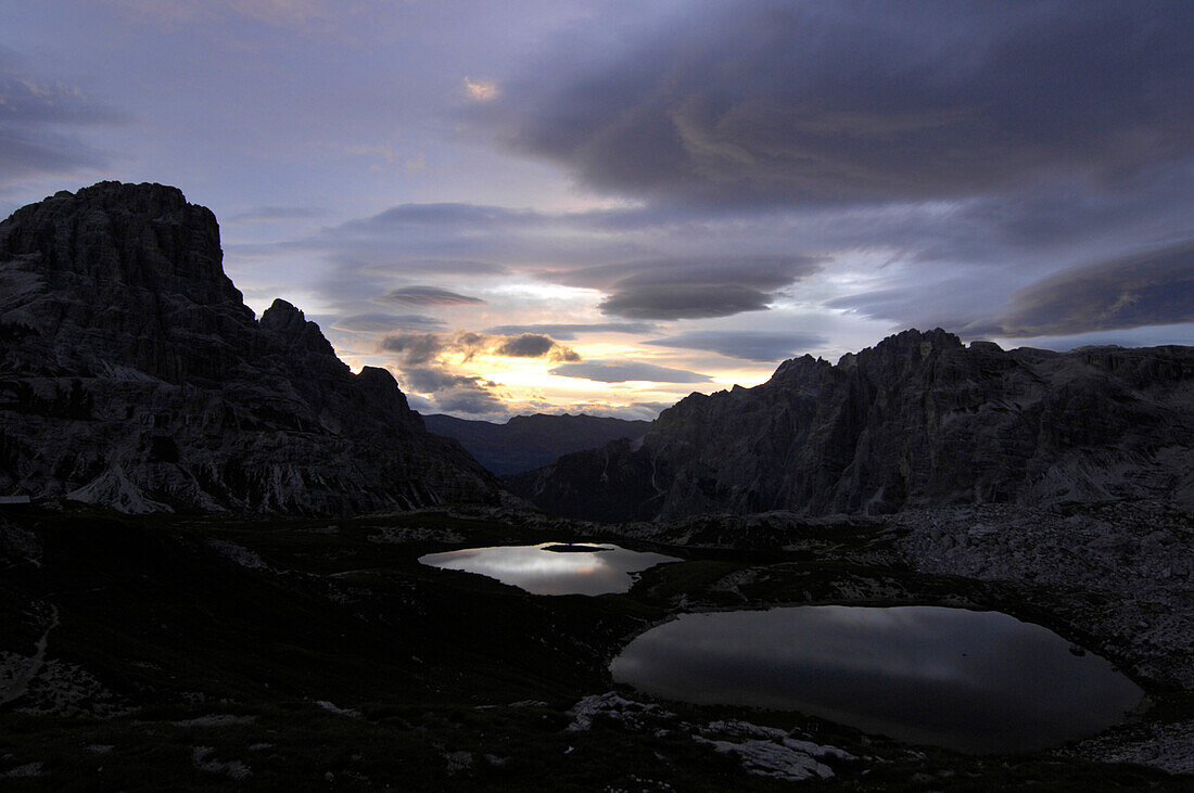 Mountain lakes, Sexten Dolomites at sunrise, Dolomites, South Tyrol, Trentino-Alto Adige, Italy