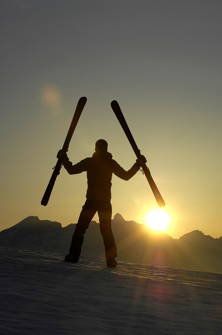 Skier at sunset, Alto Adige, South Tyrol, Italy, Europe