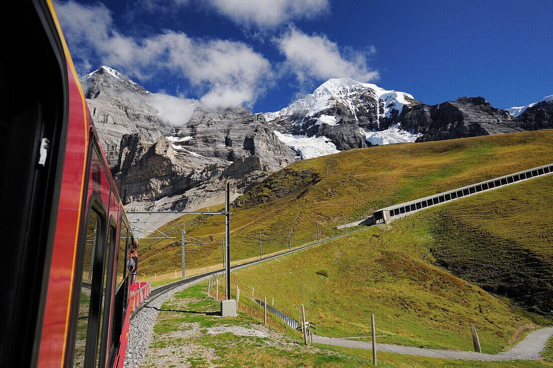Railway, Eiger and Moench in background, UNESCO World Heritage Site Jungfrau-Aletsch protected area, Bernese Oberland, canton of Bern, Switzerland
