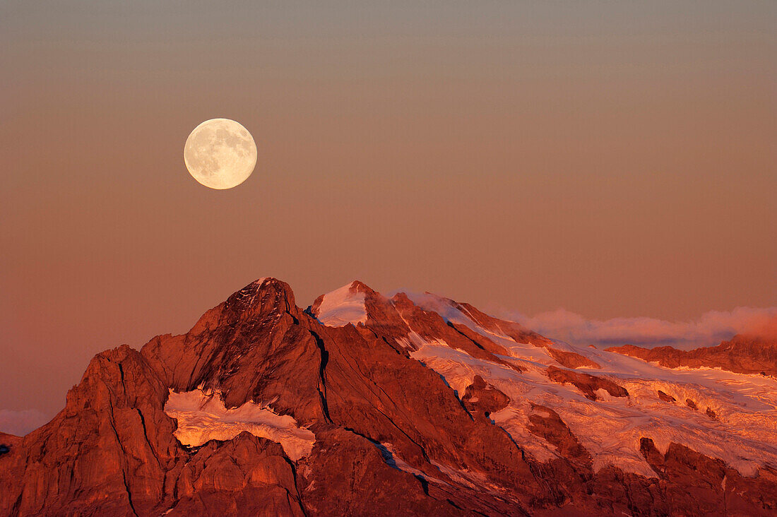 View from mount Niesen to Wetterhorn with full moon, UNESCO World Heritage Site Jungfrau-Aletsch protected area, Bernese Oberland, canton of Bern, Switzerland