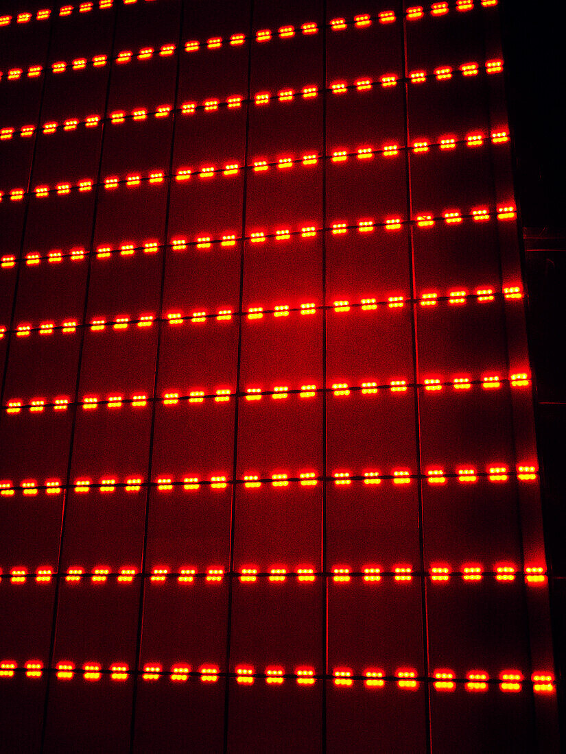 Neon Red Lights Against Wall