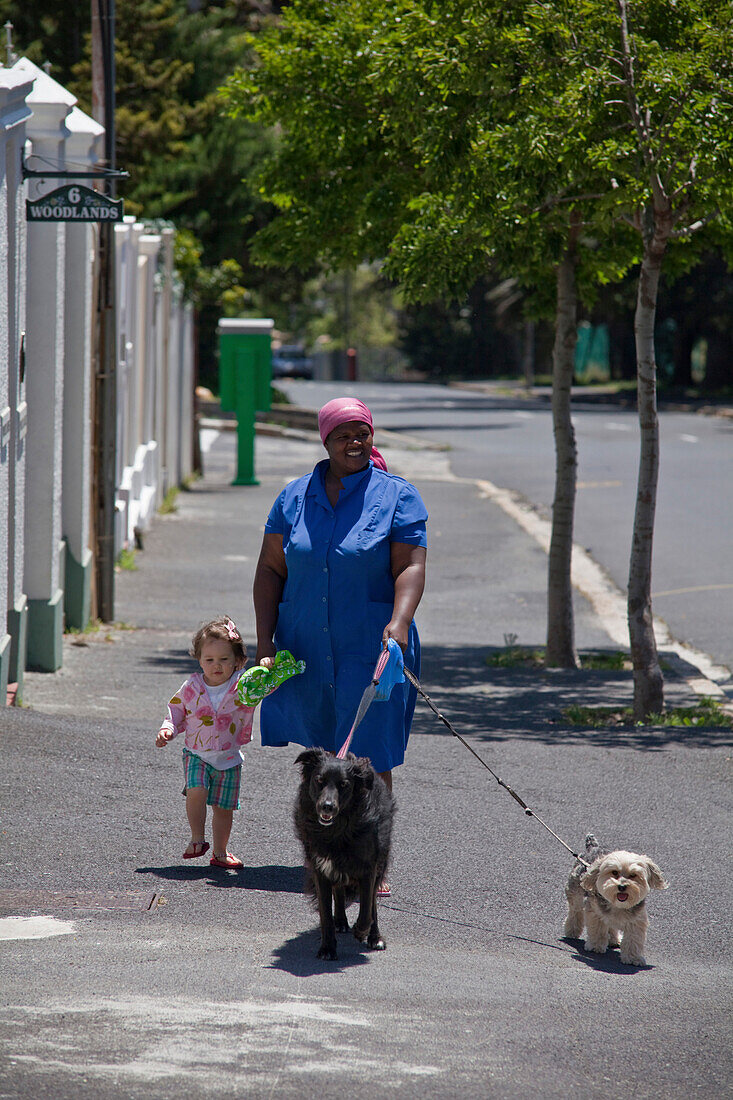 Nanny with child and dog on a stroll, Cape Town, Western Cape, South Africa