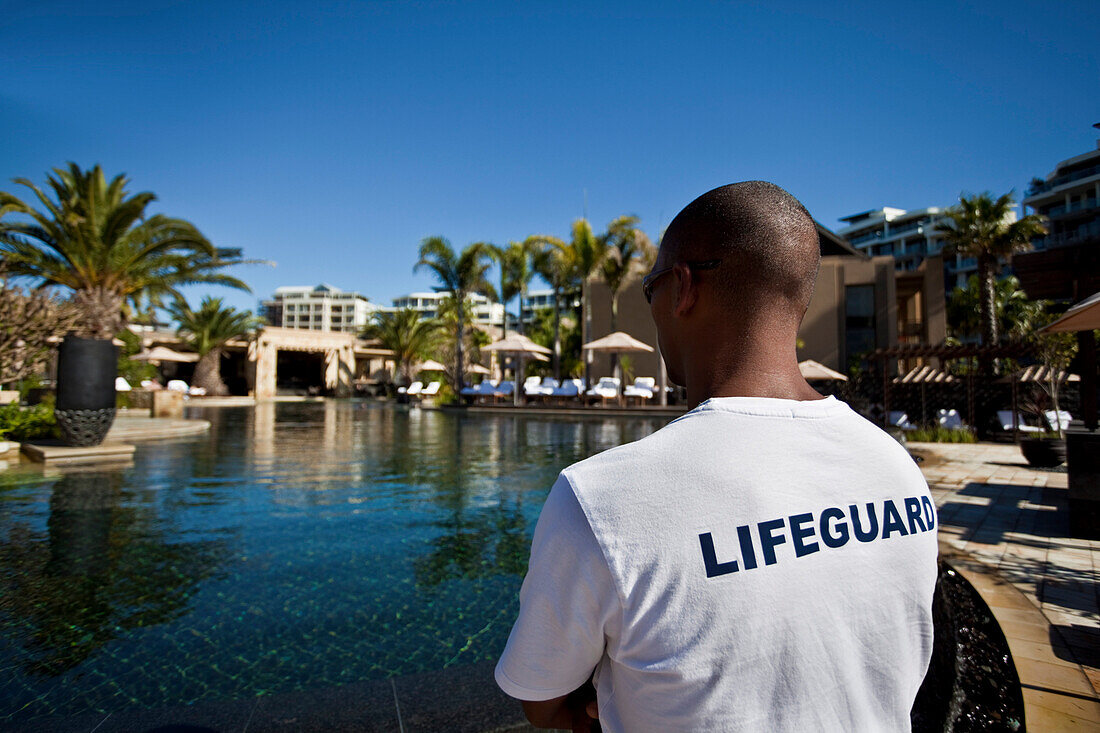 Lifeguard at swimming pool of Hotel One and Only, Cape Town, Western Cape, South Africa, RSA, Africa