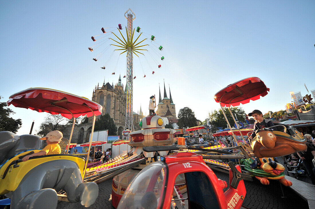 Funfair and amusement rides on Cathedral square, Erfurt, Thuringia, Germany