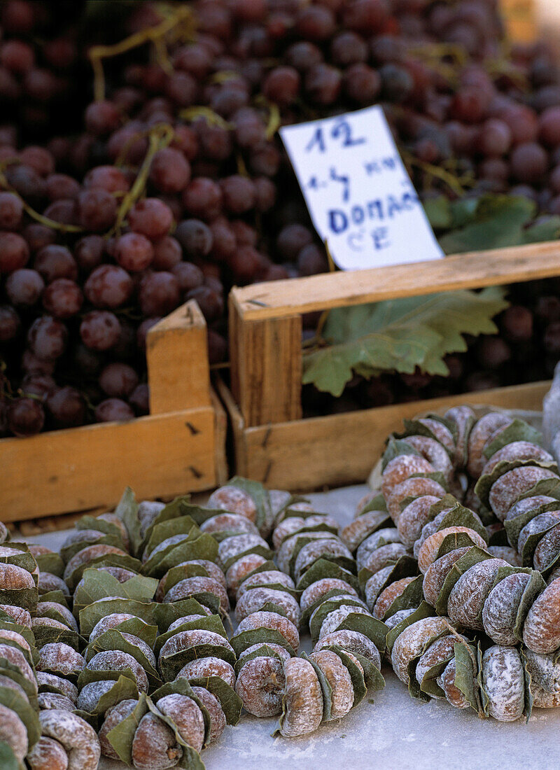 Strings of dried figs and grapes for sale in market, Dubrovnik, Crotia, Europe