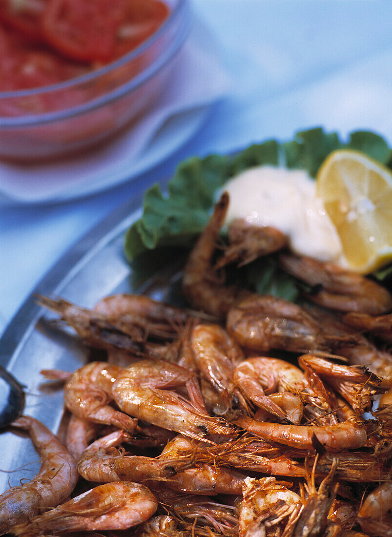 Plate of grilled prawns in restaurant on the small island of Sveti Klement off Hvar Town, Hvar, Croatia.
