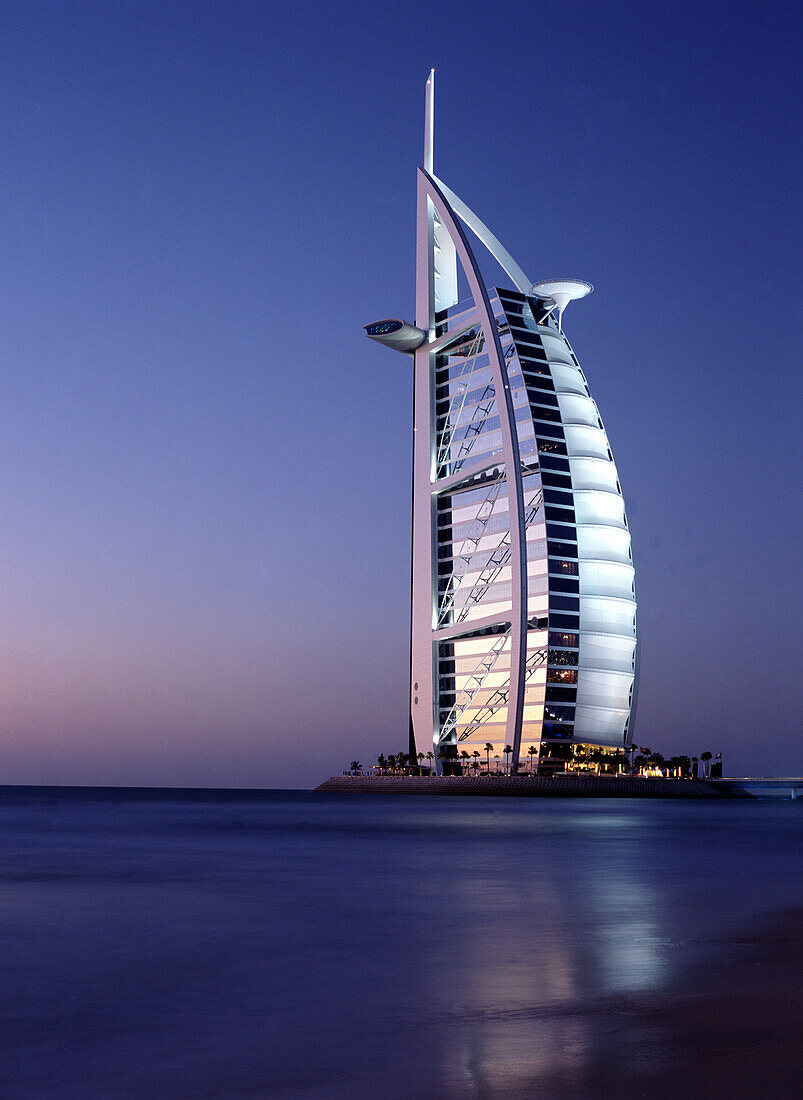 The Burj al-Arab or Arabian Tower at dusk, Dubai, United Arab Emirates