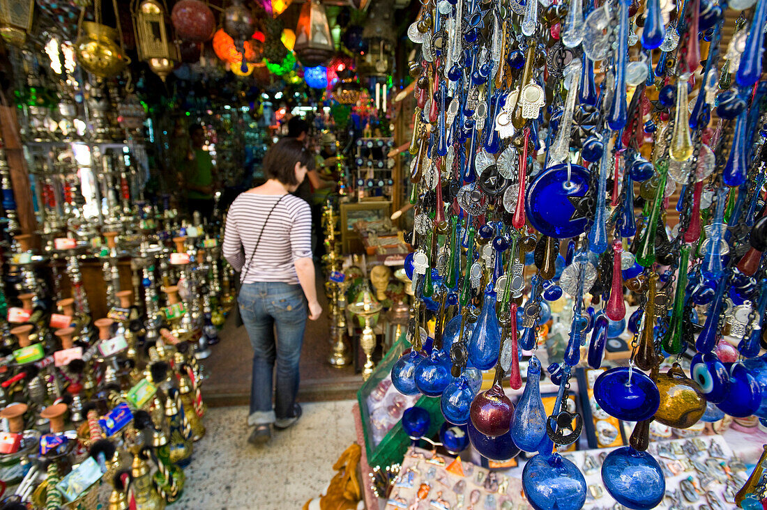 Woman looking around shops in Khan El-Khalili, Cairo, Egypt