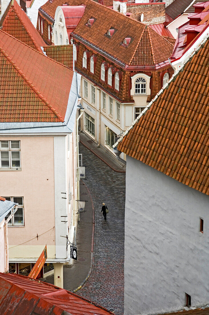 A solitary figure walking the cobbled streets of Tallinn, Aerial View, Estonia